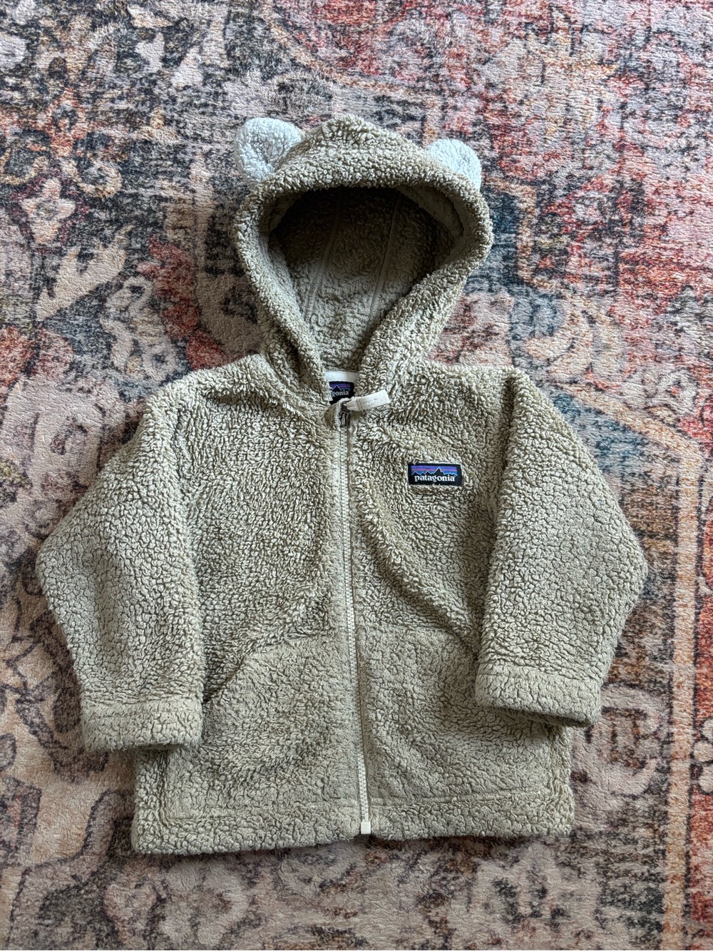 Patagonia Kids Fleece Jacket in beige with Multicolor Logo